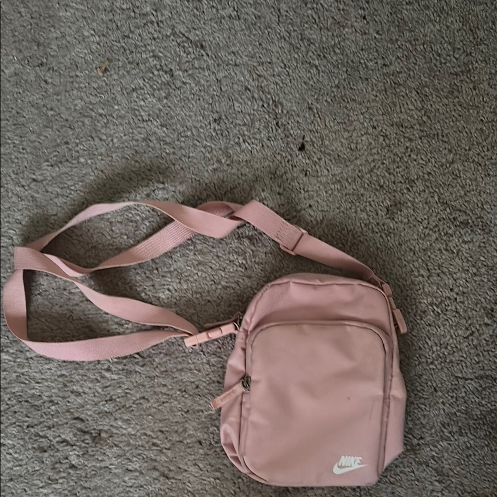 Nike Pink Crossbody Bag with Adjustable Strap and Minimalist Design